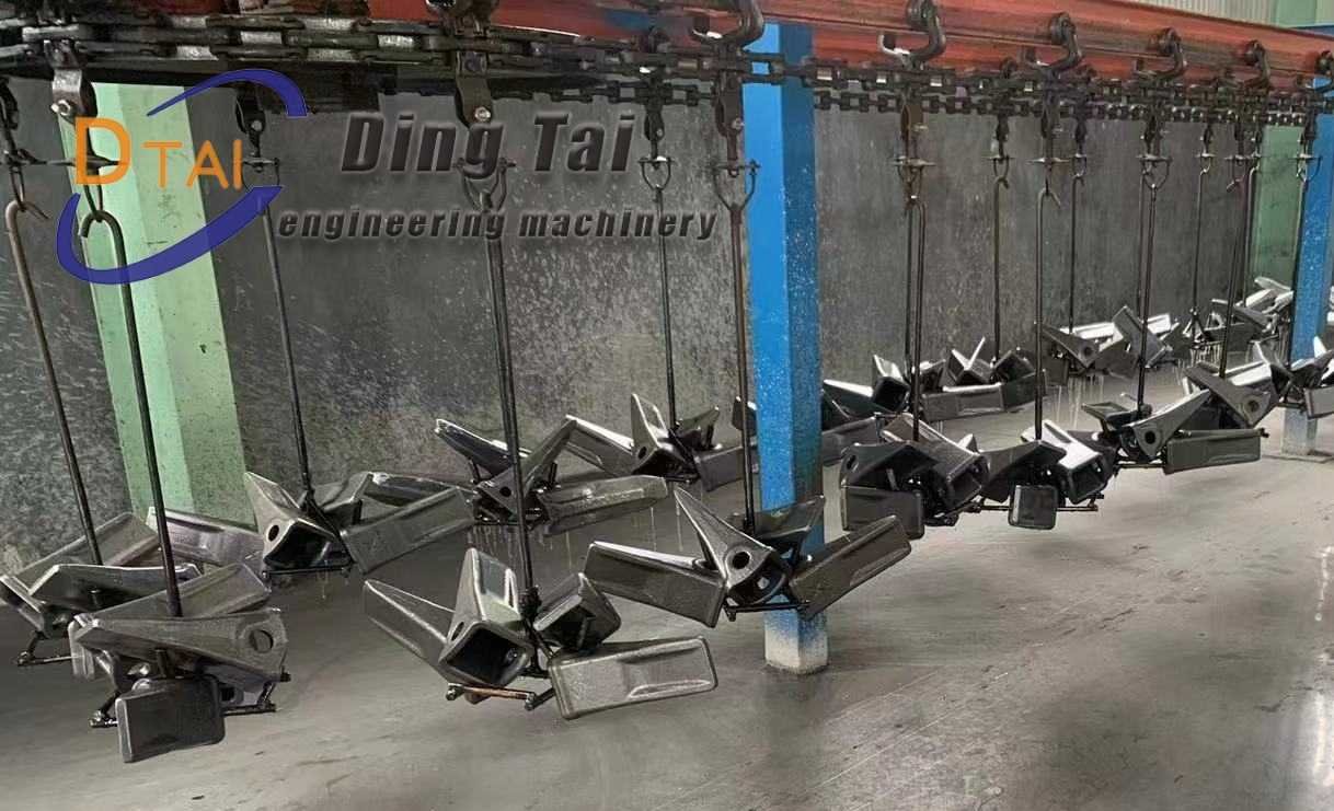 Окрашенный зуб ковша